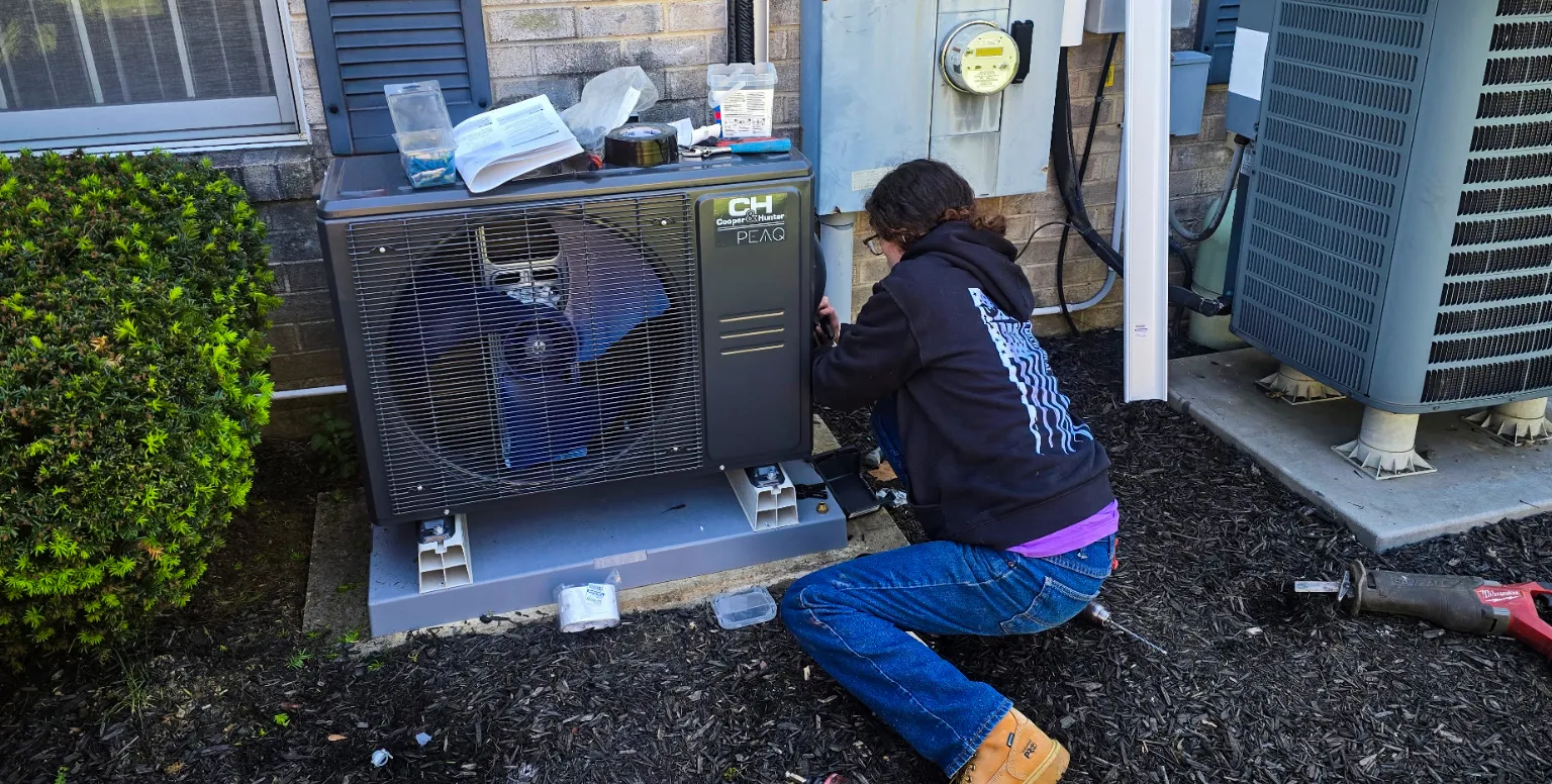Gary Paul Mechanical technician installing unit